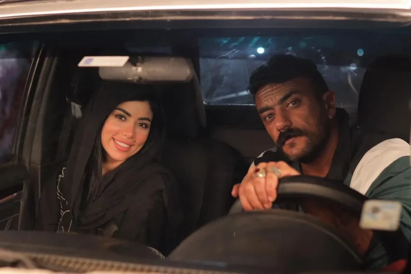 كارولين عزمي وأحمد العوضي